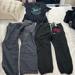Hollister woman navy blue T-shirt/ Gray and Black Joggers from Aber& and Fitch